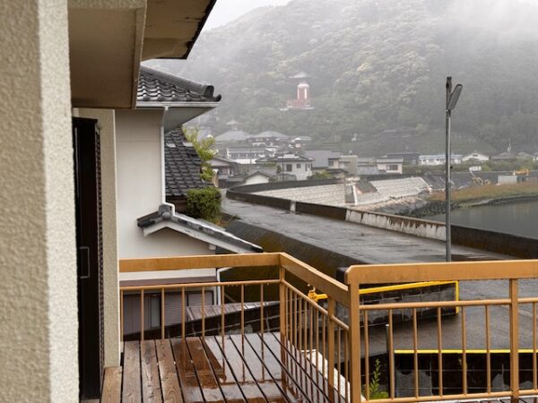 View of temple 23 from a wood deck in Hiwasa, Japan after a rainy night.