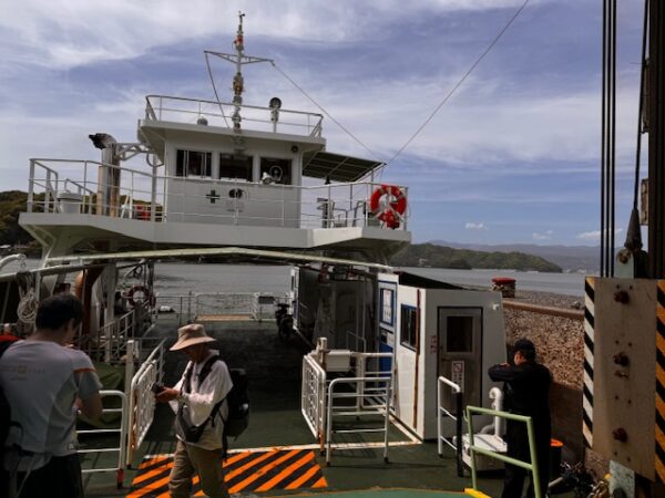 The ferry has landed at the dock.