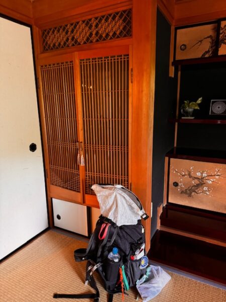 Backpack in farmhouse main room in Shikoku.