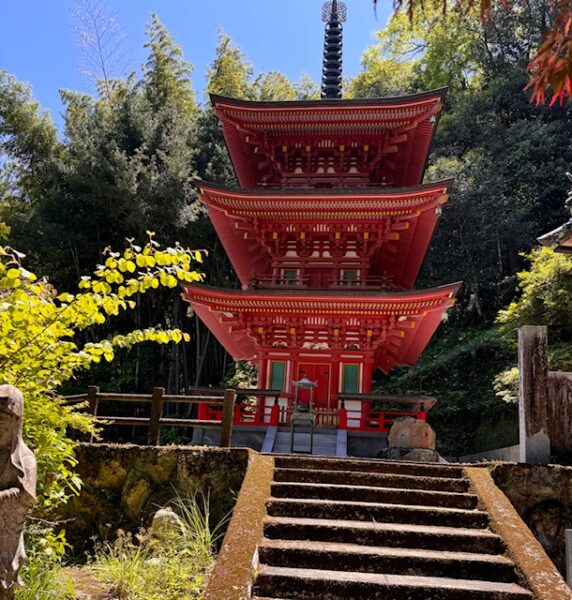 Three story pagoda fulfills a pilgrim's dreams.