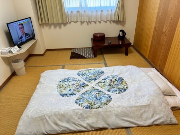 Comfy Japanese bed to stretch for the night after a long day of walking.