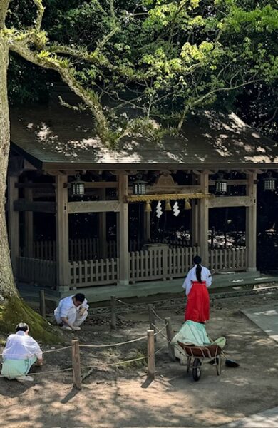 Shrine monks working on the grounds.