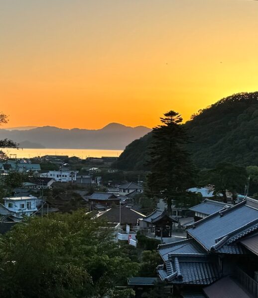 Sun setting in the mountains on Omishima island.