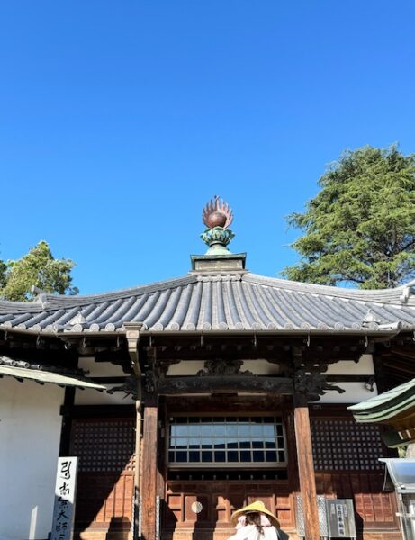 Daishi Hall topped with a flaming ball at a temple on the pilgrimage path.