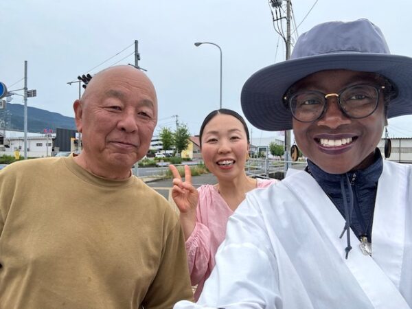 Local Japanese and ohenro on pilgrimage trail to Sankaku-ji temple.