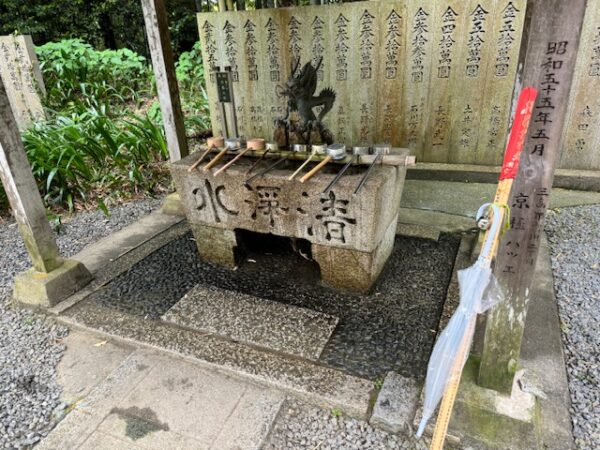 Sankaku-ji temple fountain with dragon spigot.