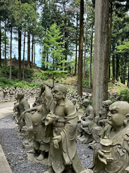 Buddha followers at Unpen-ji temple in Japan.