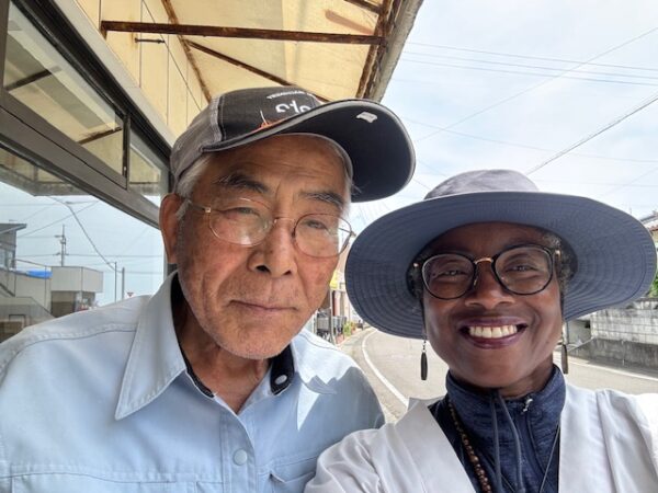 Ohenro and friendly Japanese in front of renovated Japanese guesthouse.