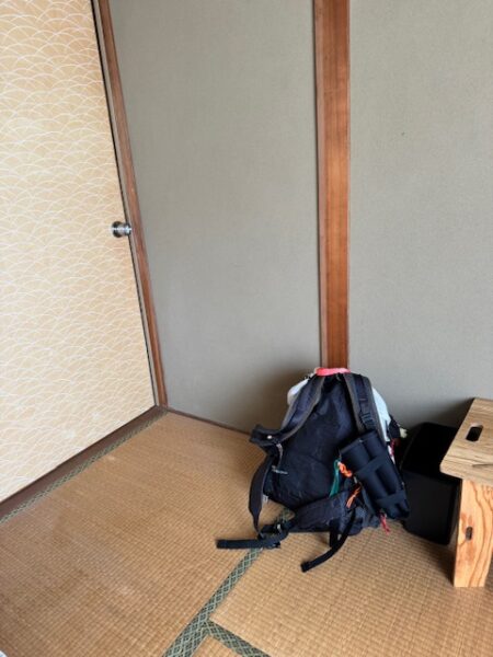 Henro backpack in renovated dorm room in Japanese guesthouse.