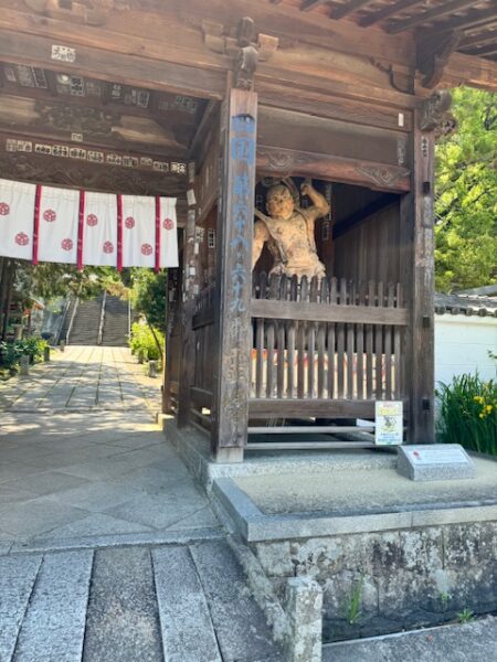 close up: Nio guardians at the gate of temples 68 and 69 on Shikoku pilgrimage.