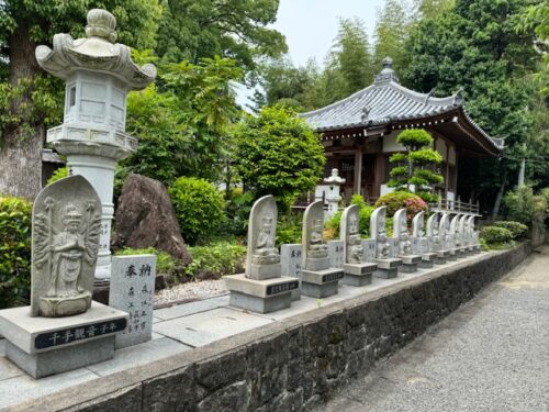 Buddhas lined in a row at temple rebuilt by Kukai.