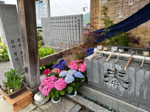 Temple fountain and flowers.