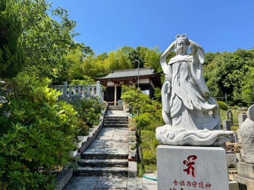 Statue of Awashima, patron saint of women, bringing refuge and peace.