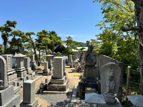 Tombstones and memorial markers along the mairi path on Shikoku pilgrimage in Japan.4