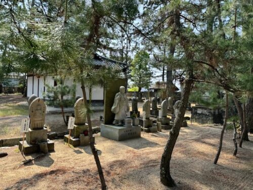 Mini pilgrimage figures at Kokubun-ji, home of the 7-storied pagoda, Kagawa, Japan.