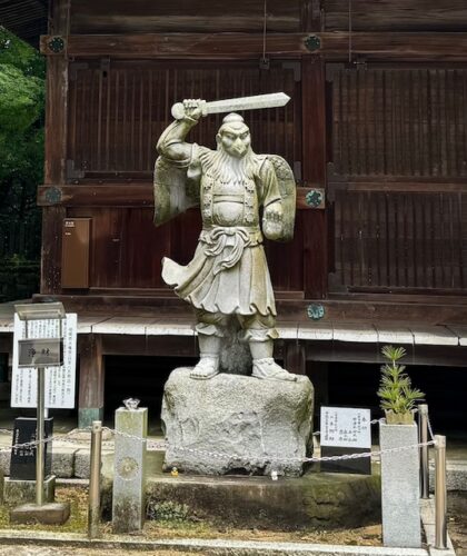 A crow tengu guards the Emperor's tomb.