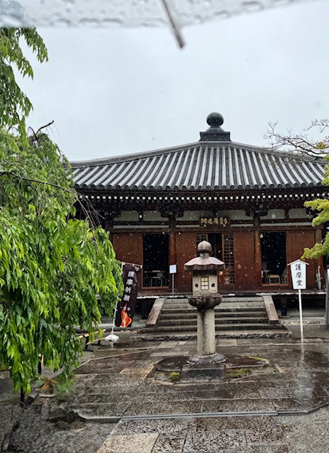 Rain falls on prayer hall.