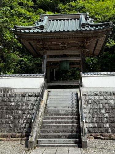 Bell tower at too of stone steps at Okubo-ji temple on Shikoku island.