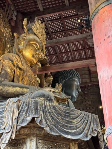 golden Kannon beside Great Buddha in Kara, Japan.