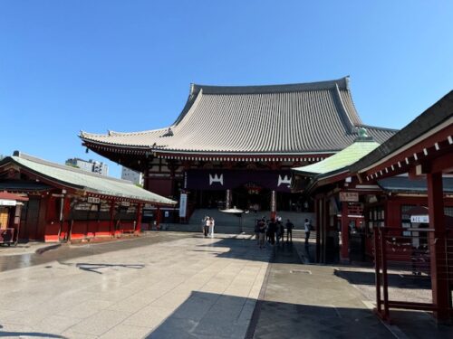 Main hall with purple banner at Senso-ji temple in Tokyo.3