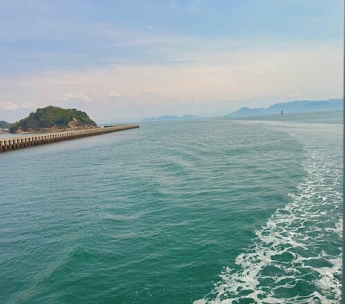 Ripples on the water from a ferry on the way to Naoshima.