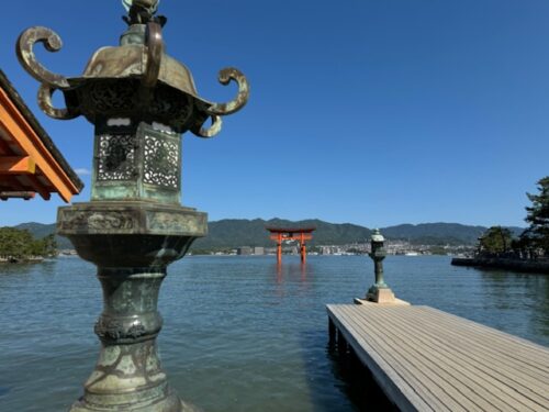 View of red torii from Itsukushima Shrine at Miyajima.