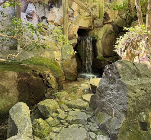 Waterfall beneath main hall at Mitaki-dera in Hiroshima.